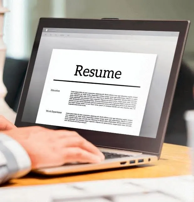 New hire onboarding documents on a laptop